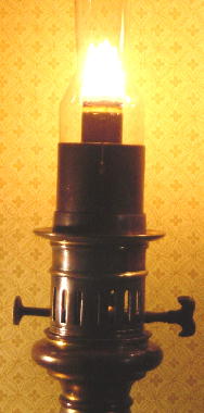 Moderator-lamp with a spring-driven pump